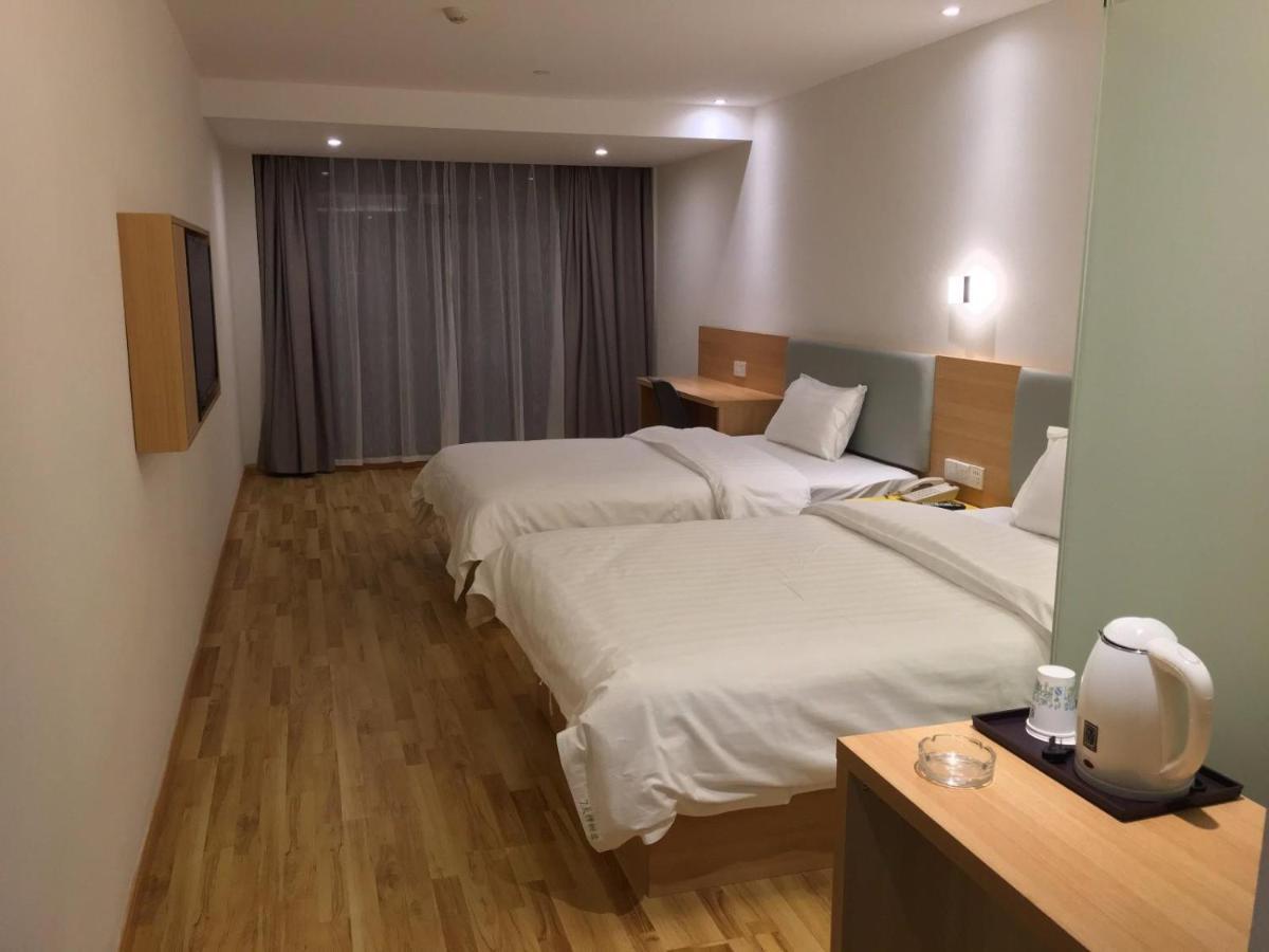 7Days Inn Zhangshu Xingfo Road Branch Εξωτερικό φωτογραφία